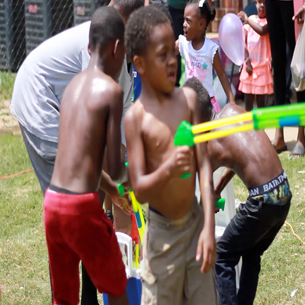 Midnight Basketball - Guys Holding Up Heal America T-shirts